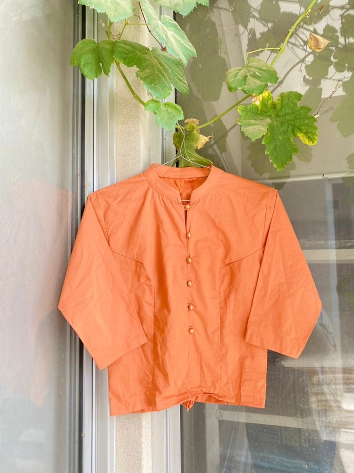 Orange cotton blouse